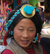 Woman in traditional headdress. Photo: Scot Frank