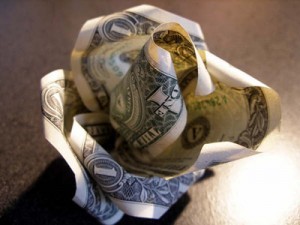 Crumpled up dollar bill