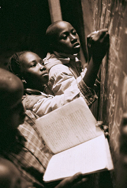 Children studying at night