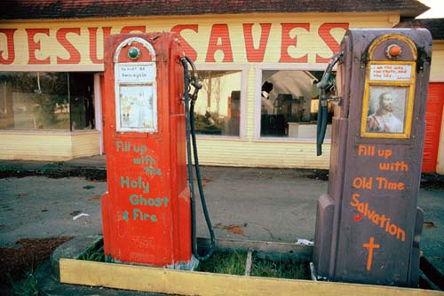 Gas station turned into religious meeting hall, April 1974