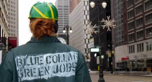 green-jobs-workforce-recess Worker wearing \"Blue collar, Green jobs\" slogan jacket