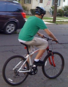 Charlie on his bike in July
