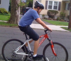Charlie Fisher riding his bike