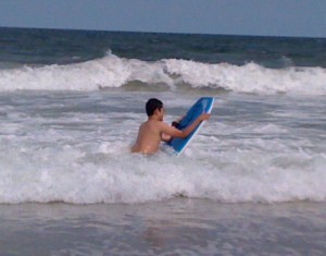 Charlie using his new boogie board Charlie using his new boogie board