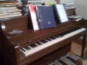 our piano and Charlie's music books