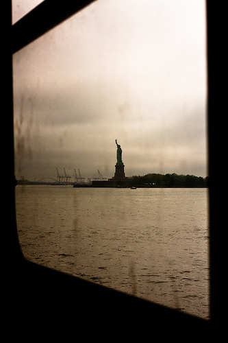 Statue of Liberty as seen through glass