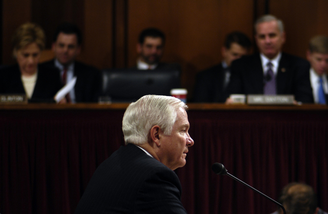 Secretary of Defense nominee Robert Gates responds to a question regarding his confirmation during a Senate Armed Services Committee hearing in Washington, D.C., Dec. 5, 2006.