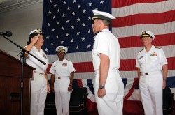 NORFOLK (July 29, 2010) Rear Adm. Nora W. Tyson salutes Capt. Jeffrey A. Hesterman during a change of command ceremony in the hangar bay aboard the aircraft carrier USS George H.W. Bush (CVN 77). Tyson assumed command of Carrier Strike Group (CSG) 2, which will embark aboard George H.W. Bush, the Navy's newest aircraft carrier. (U.S. Navy photo by Naval Aircrewman 3rd Class Joshua K. Horton/Released)