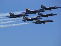 The six Navy Blue Angels in a close formation.